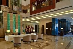 Luxury hotel lunch area with elegant seating and ambient lighting